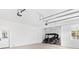 Clean, well-lit garage with golf cart parking, offering ample space and functionality at 915 Laurel Brooke Ave, Peachtree City, GA 30269
