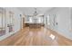 Hardwood floors span the open floor plan of this bright and airy home at 915 Laurel Brooke Ave, Peachtree City, GA 30269