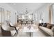 Spacious living room with hardwood floors and lots of natural light at 915 Laurel Brooke Ave, Peachtree City, GA 30269