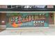 Colorful mural that reads, 