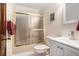 Bathroom with a sliding glass shower door and white vanity sink at 95 Oak Grove Cir, Mcdonough, GA 30253