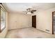 Bedroom featuring carpet, window with blinds, and a dark wood closet door at 95 Oak Grove Cir, Mcdonough, GA 30253