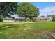 Sprawling ranch-style home with lush lawn and mature trees in a serene, country setting at 95 Oak Grove Cir, Mcdonough, GA 30253