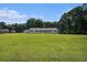 Charming single-story home with a detached garage, set on a large, verdant lot at 95 Oak Grove Cir, Mcdonough, GA 30253