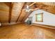 Attic with high ceilings, wood floors, and windows at 1975 Mack Rd, Douglasville, GA 30135