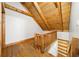 Hallway on the second level with wooden floors and white walls at 1975 Mack Rd, Douglasville, GA 30135