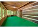 The porch boasts natural wood design at 1975 Mack Rd, Douglasville, GA 30135