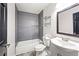 Updated bathroom with a bathtub, mosaic tile accents, and contemporary fixtures at 240 W Lake Nw Dr, Atlanta, GA 30314