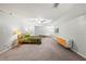 Spacious bedroom with neutral color scheme and a ceiling fan at 240 W Lake Nw Dr, Atlanta, GA 30314