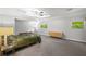 Large main bedroom with tray ceilings, ensuite bath, and large windows at 240 W Lake Nw Dr, Atlanta, GA 30314