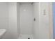 Modern shower with white subway tile surround and brushed nickel fixtures in bathroom at 240 W Lake Nw Dr, Atlanta, GA 30314