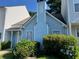 Charming exterior featuring light blue siding and a well-maintained front yard landscape at 5961 Sherwood Trce, Stonecrest, GA 30038