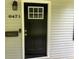 Inviting front door with glass insert, traditional hardware, and house number display at 6471 Ansley Blvd, Lithia Springs, GA 30122