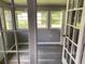 Cozy sun room with bright natural light and views from multiple windows at 6471 Ansley Blvd, Lithia Springs, GA 30122
