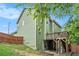 Exterior of house featuring a wood deck with stairs leading to the yard at 157 Spur Ln, Hiram, GA 30141