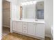 Primary bathroom featuring a double vanity, great mirror and good lighting at 157 Spur Ln, Hiram, GA 30141