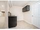 Convenient wet bar featuring tile backsplash and overhead cabinets at 157 Spur Ln, Hiram, GA 30141