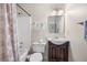 Well-lit bathroom with shower-tub, white toilet, and vanity providing a functional and clean space at 1901 Brittania Cir, Woodstock, GA 30188