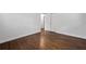 Cozy bedroom featuring hardwood floors, white trim and an open doorway at 1971 Hooper St, Decatur, GA 30032