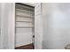 Organized walk-in closet with custom shelving for ample storage at 1971 Hooper St, Decatur, GA 30032