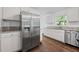 Bright kitchen with stainless steel appliances, white cabinets and granite countertops at 1971 Hooper St, Decatur, GA 30032