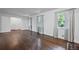 Large living room with hardwood floors, lots of light, and neutral paint at 1971 Hooper St, Decatur, GA 30032