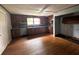 Spacious kitchen featuring wood floors and traditional cabinets and countertops at 29 Ivy St, Porterdale, GA 30014