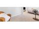 Bedroom features neutral tones, a corner chair, and new carpet at 411 Riverclub Rd, Acworth, GA 30101