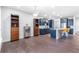 Spacious open-concept kitchen featuring an island with bar seating and stainless steel appliances at 411 Riverclub Rd, Acworth, GA 30101