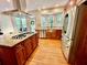 Bright, updated kitchen with stainless steel appliances, an island gas cooktop, and eat in area at 4265 Lansmoore Xing, Suwanee, GA 30024