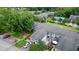 Aerial view of community with pool and green spaces at 4977 Meadow Ln, Marietta, GA 30068