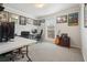 This bedroom features two computer setups, decor, and a guitar at 4977 Meadow Ln, Marietta, GA 30068