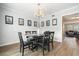 A formal dining room showcases stylish decor, with room to seat six around the dining table at 4977 Meadow Ln, Marietta, GA 30068