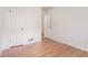 Inviting bedroom featuring hardwood floors and closet for ample storage at 1260 Fork Creek Trl, Decatur, GA 30033