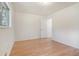Bedroom with hardwood floors, closet, and natural light at 1260 Fork Creek Trl, Decatur, GA 30033