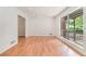 Bright living space with hardwood floors and a large window with a lovely view at 1260 Fork Creek Trl, Decatur, GA 30033