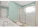 Bathroom featuring a sink, toilet and shower with sliding glass door at 136 Peachtree Memorial Nw Dr # Ct-6, Atlanta, GA 30309