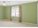 Relaxing bedroom with large window, neutral carpet, and soft, natural light at 136 Peachtree Memorial Nw Dr # Ct-6, Atlanta, GA 30309