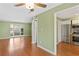 Living room featuring hardwood floors that opens to the kitchen at 136 Peachtree Memorial Nw Dr # Ct-6, Atlanta, GA 30309