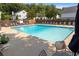 Inviting community pool with lounge chairs and manicured landscaping, perfect for relaxation and recreation at 136 Peachtree Memorial Nw Dr # Ct-6, Atlanta, GA 30309