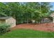 View of the backyard and sheds at 1420 Pilgrim Rd, Cumming, GA 30040