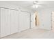 Bright, spacious bedroom with neutral carpet and closet space at 1420 Pilgrim Rd, Cumming, GA 30040