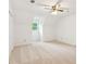 Bright bedroom with neutral carpet, closet, and a window offering natural light at 1420 Pilgrim Rd, Cumming, GA 30040