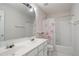 Bathroom featuring a double sink vanity, shower and tub combination and good lighting at 3616 Myrtlewood Nw Ct, Kennesaw, GA 30144