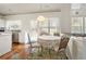Eat-in kitchen with breakfast nook featuring hardwood floors and lots of natural light at 3616 Myrtlewood Nw Ct, Kennesaw, GA 30144