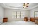 Large main bedroom features a tray ceiling, carpet, and a window at 3616 Myrtlewood Nw Ct, Kennesaw, GA 30144