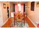 Inviting dining room with wood floors and a rustic dining set, ideal for gatherings at 636 North Ave # 11E, Jonesboro, GA 30236
