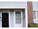 A close-up of the entrance showcasing the detail of the townhome at 636 North Ave # 11E, Jonesboro, GA 30236