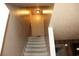 View of carpeted stairway and walls at 636 North Ave # 11E, Jonesboro, GA 30236