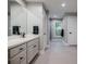 Modern bathroom featuring a sleek vanity with drawers and ample storage space at 1510 Chevron Dr, Sandy Springs, GA 30350